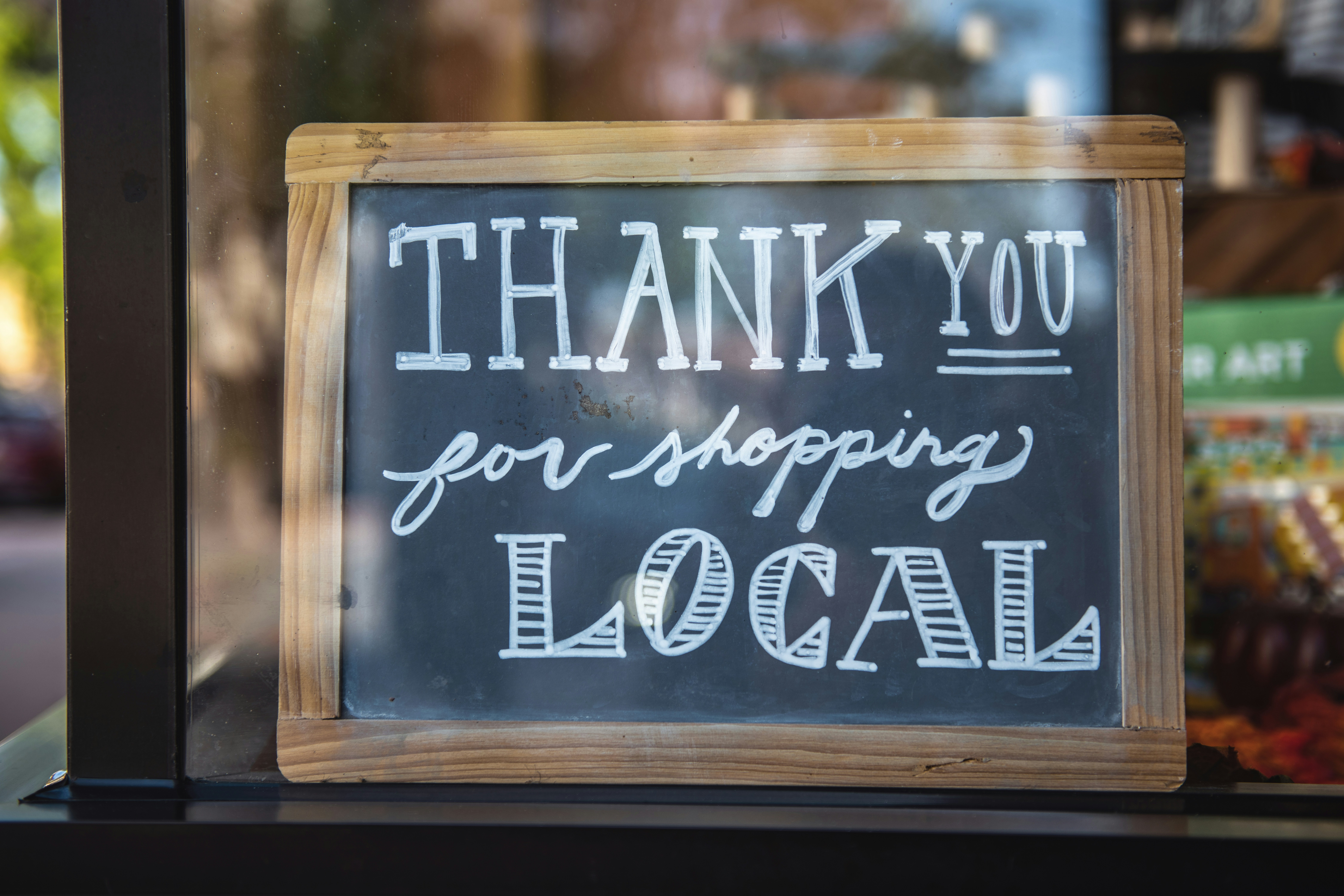 Picture of a shopping local sign