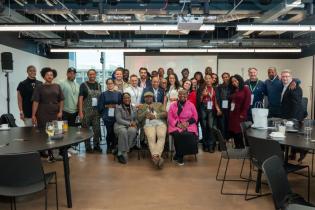 Team of people from large investor and entrepreneurs event