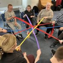 Image of a group participating in a group activity